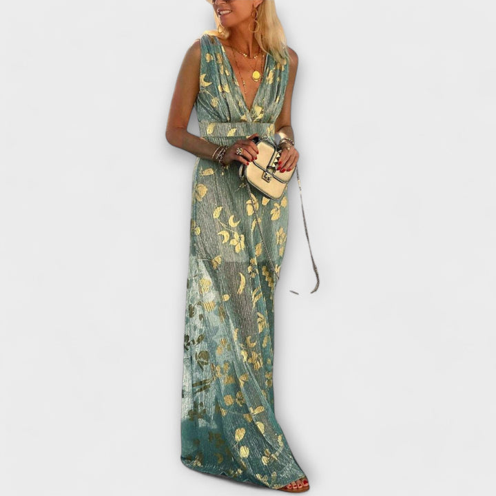 Vestido fluido com decote em V e detalhes em lantejoulas