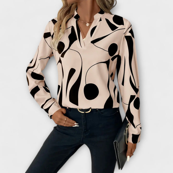Blusa elegante de mangas compridas com decote em V