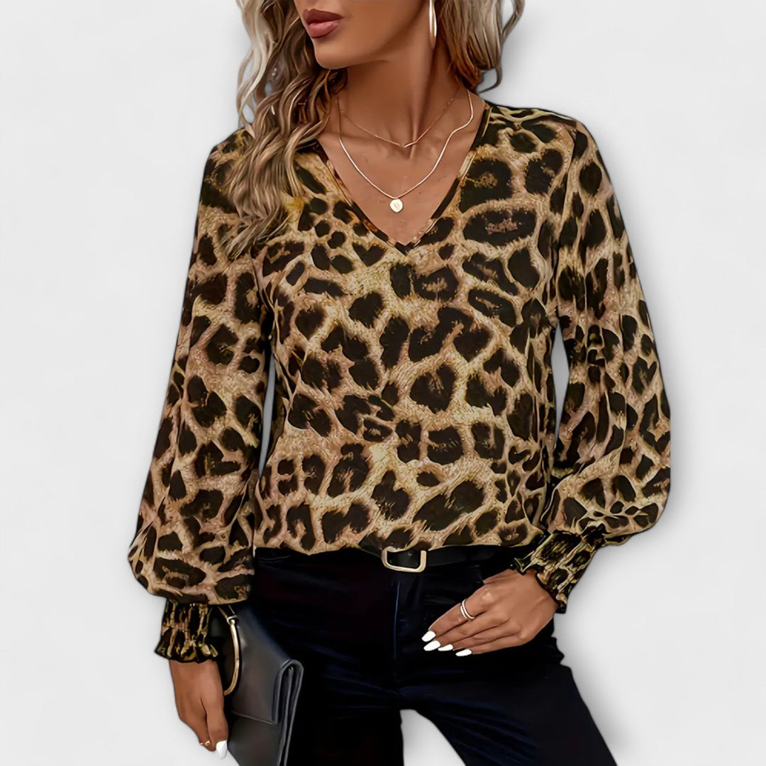 Blusa elegante com padrão de leopardo