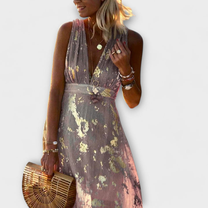 Vestido fluido com decote em V e detalhes em lantejoulas