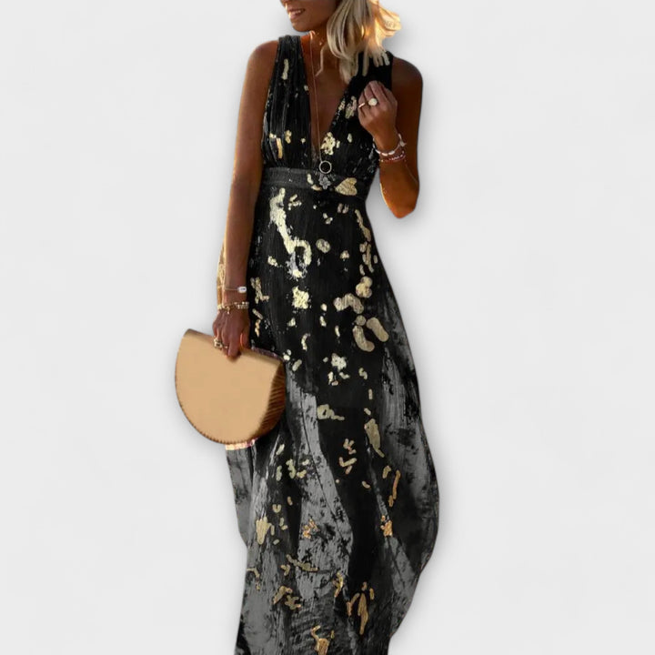 Vestido fluido com decote em V e detalhes em lantejoulas