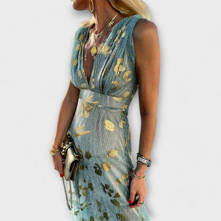 Vestido fluido com decote em V e detalhes em lantejoulas