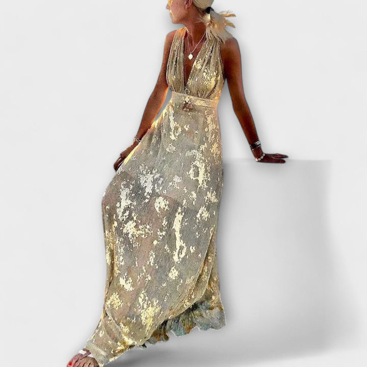 Vestido fluido com decote em V e detalhes em lantejoulas