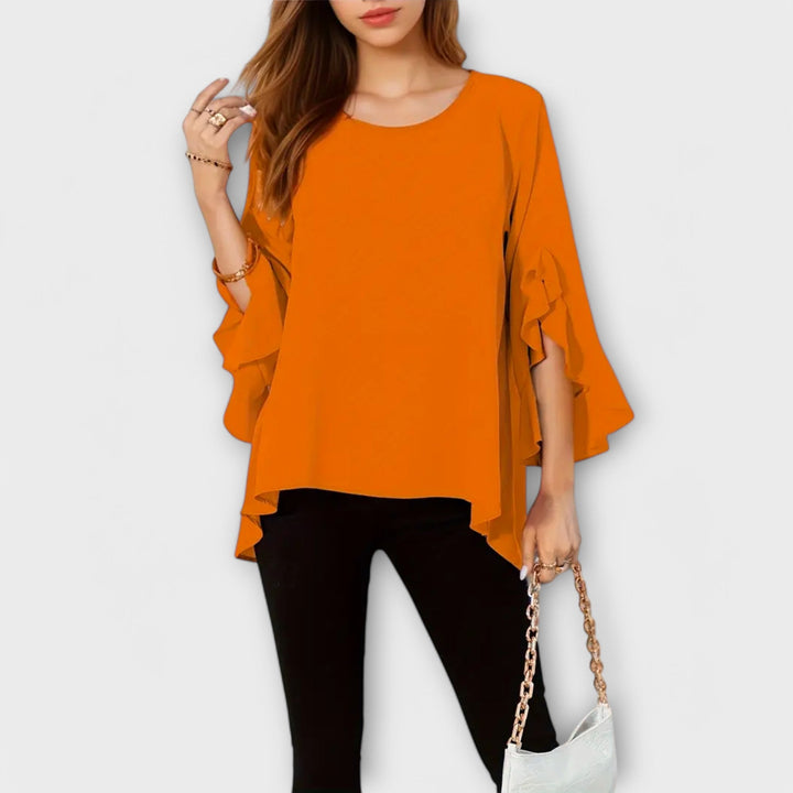 Aria - A blusa de primavera perfeita com decote redondo