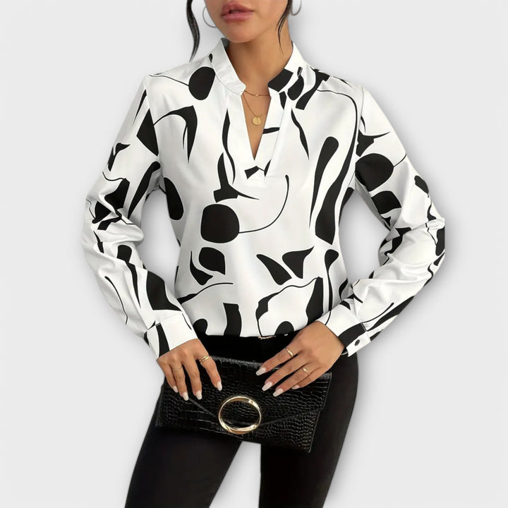 Blusa elegante de mangas compridas com decote em V